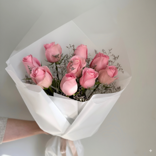 ვარდისფერი ვარდების თაიგული